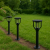 Wysoka lampa solarna 79 cm do ogrodu – widok na rozstawione słupki wśród zieleni