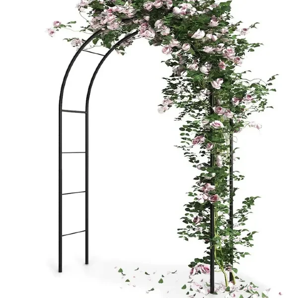 Pergola z bogatą dekoracją Łuk ogrodowy wypełniony kwiatami, idealny na śluby i uroczystości.